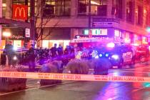 Police work the scene of a shooting on Third Avenue and Pine Street, Wednesday, Jan. 22, 2020, ...