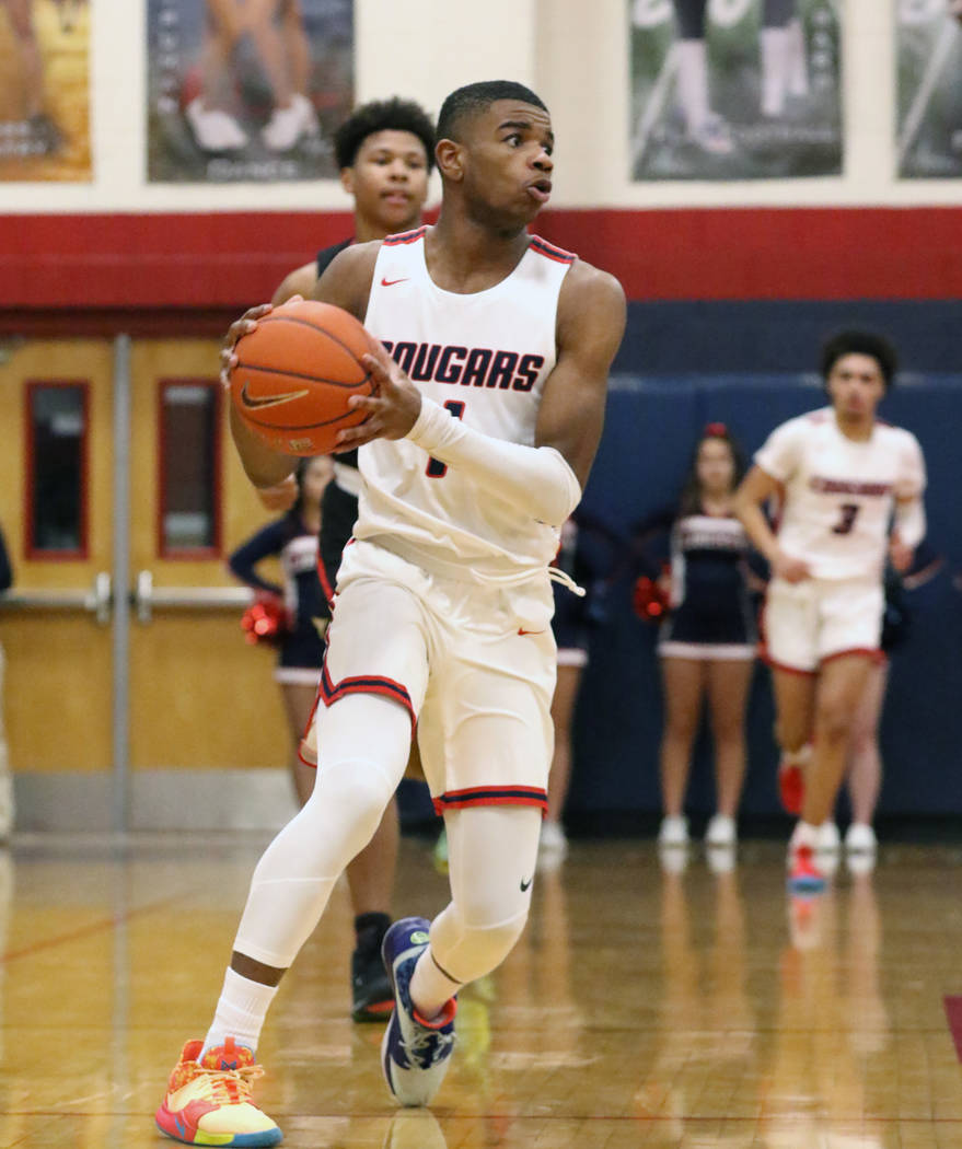 Coronado High's Jaden Hardy (1) drives the ball against Liberty High during the third quarter o ...