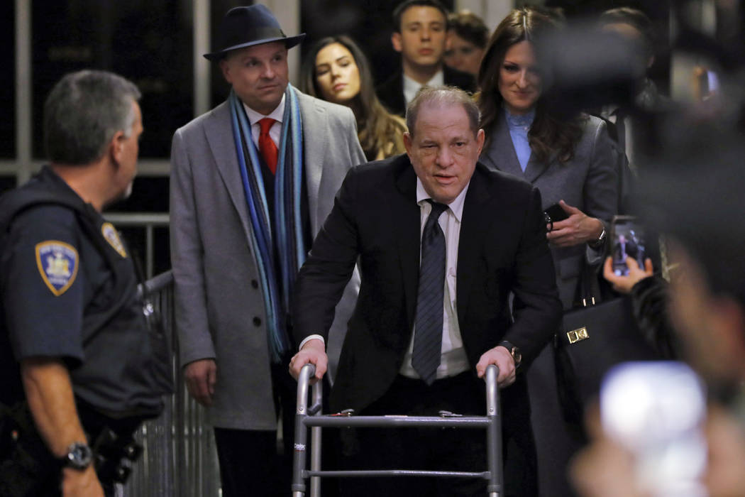 Harvey Weinstein leaves court in his rape trial, in New York, Wednesday, Jan. 22, 2020. Two of ...