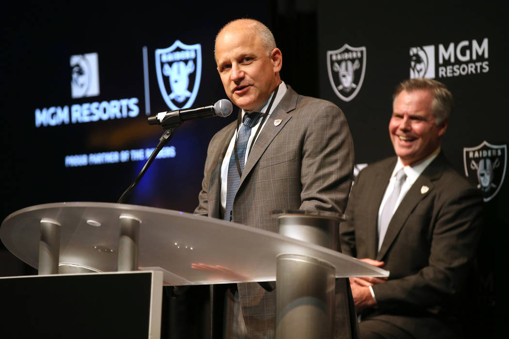 Raiders President Marc Badain, left, and Jim Murren, MGM Resorts CEO and chairman, announce a p ...