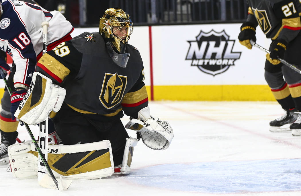 Golden Knights goaltender Marc-Andre Fleury (29) looks at the net after getting scored on by th ...