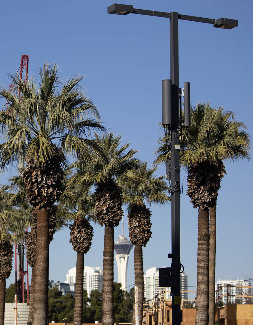 A small cell site is installed on a street light on Flamingo Road on Friday, Jan. 31, 2020, in ...