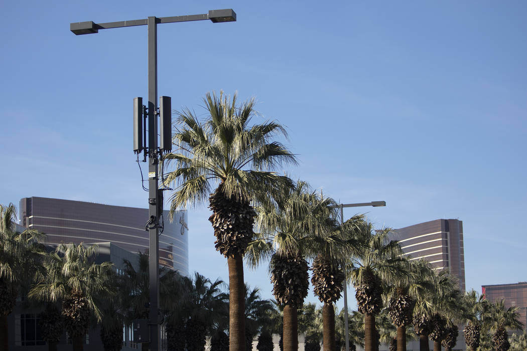 A small cell site is installed on a street light on Flamingo Road on Friday, Jan. 31, 2020, in ...