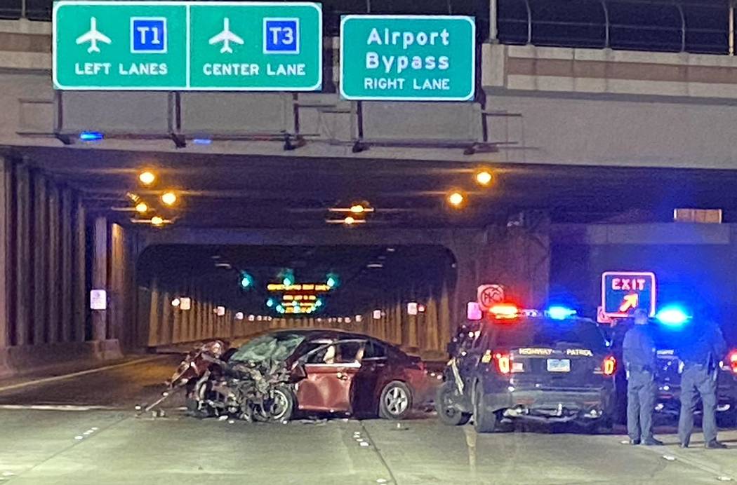 Nevada Highway Patrol troopers investigate a Chevy Cruze involved in a fatal, wrong-way crash o ...