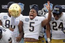 Notre Dame cornerback Troy Pride Jr. (5) celebrates after getting a win over Iowa State in the ...