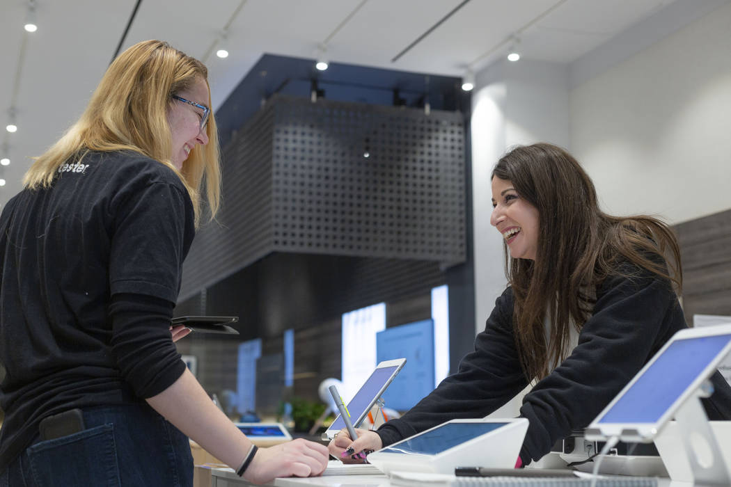 b8ta tester Arden Stockwell, left, and b8ta store manager Laynie Shrago, test the Neo Smartpen ...