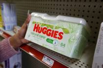Alice White displays a package of Huggies disposable wipes at Pucci's Leader Pharmacy in Sacram ...