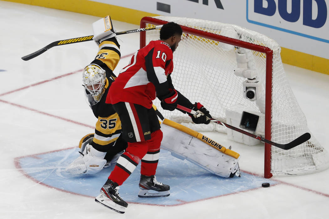 Pittsburgh Penguins goalie Triastn Jarry stops a Ottawa Senators' Anthony Duclair shot during t ...