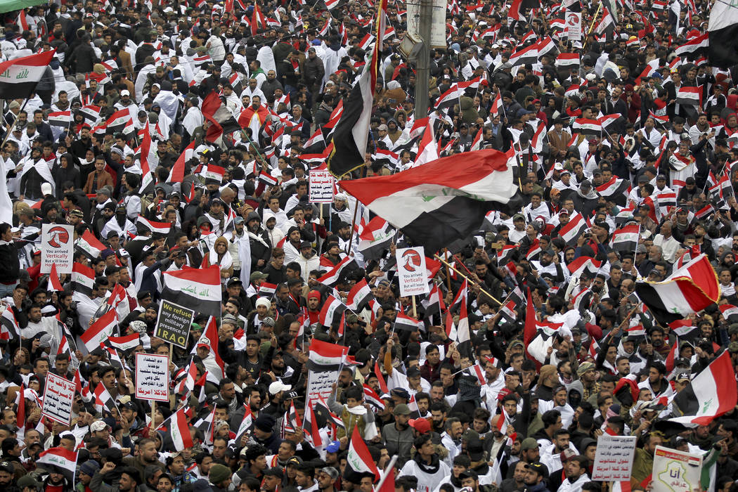 Followers of Shiite cleric Muqtada al-Sadr gather in Baghdad, Iraq, Friday, Jan. 24, 2020. Thou ...
