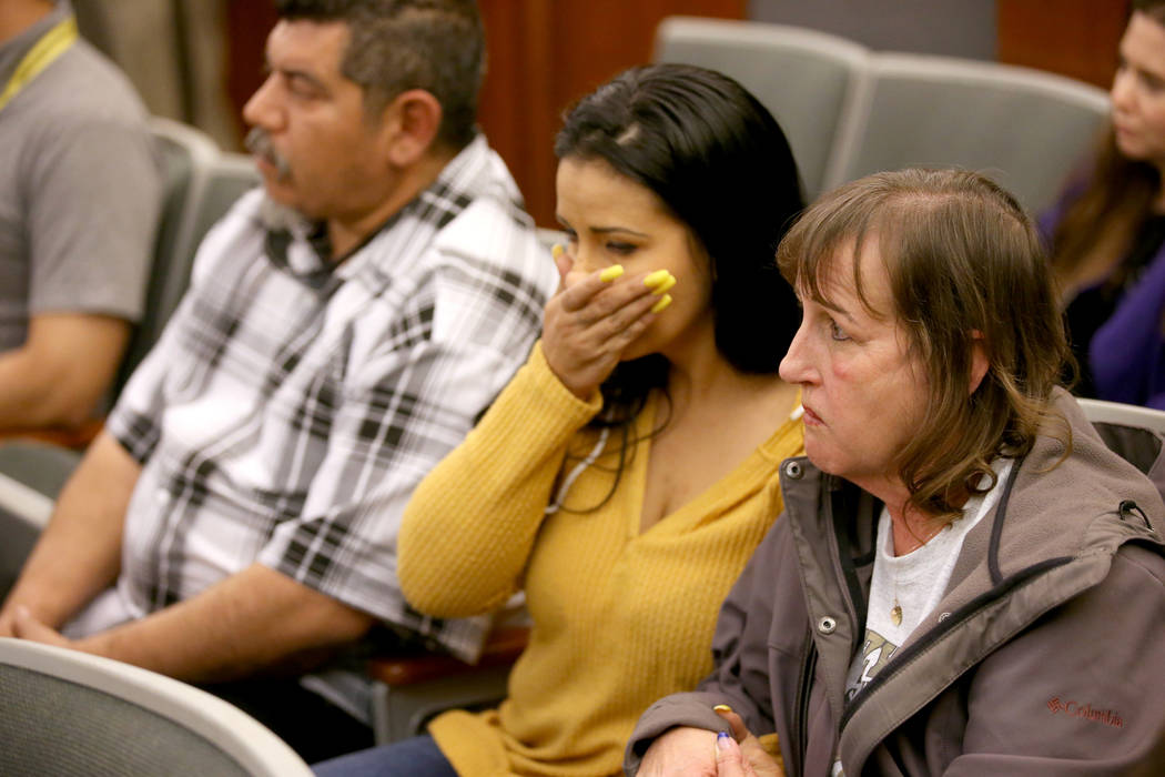 Alice Garcia, sister of Kelly Deanne Kazoon, right, reacts, with Kazoon's brother-in-law Pas Ma ...
