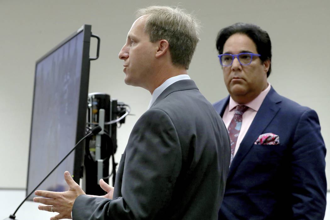 Defense attorney Lorne Berkeley, left, representing NFL free agent