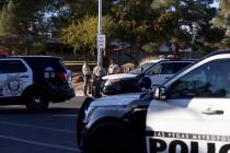 Las Vegas police investigate a shooting near Desert Pines High School in Las Vegas, Friday, Jan ...