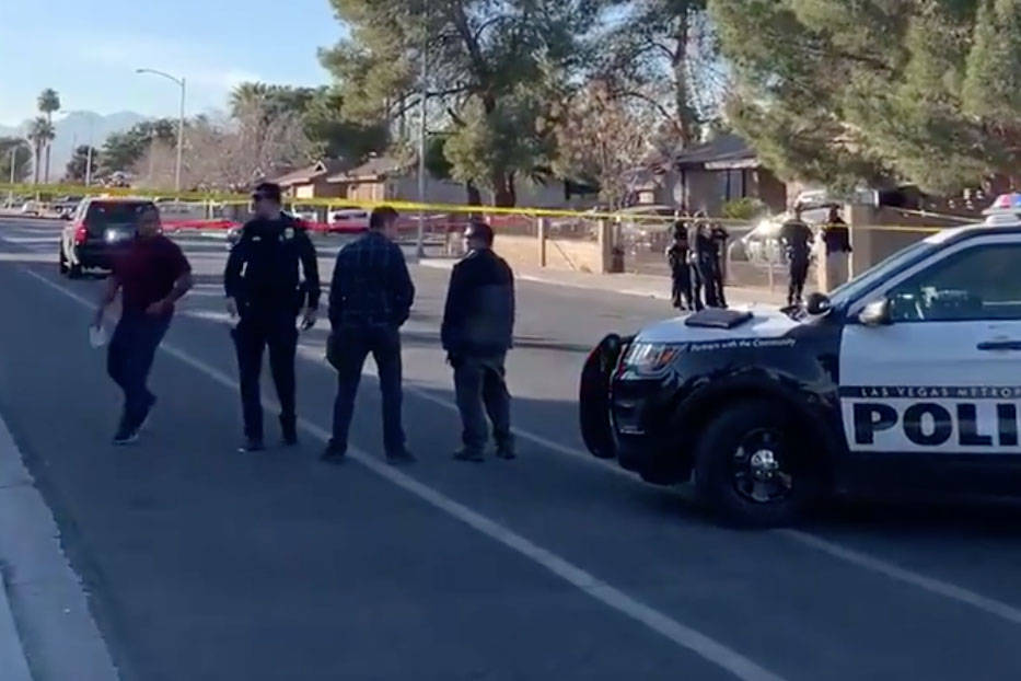 Las Vegas police investigates a shooting near Desert Pines High School in Las Vegas, Friday, Ja ...