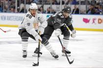 Boston Bruins forward David Pastrnak (88) moves the puck against Vegas Golden Knights forward M ...