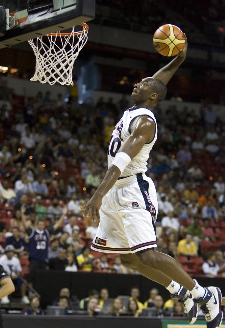 Los Angeles Lakers guard Kobe Bryant dunks in the first half of Team USA's 113-63 victory over ...