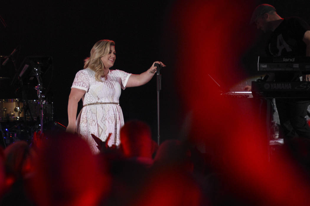 Kelly Clarkson onstage at the iHeartRadio Summer Pool Party at Caesars Palace in Las Vegas on S ...