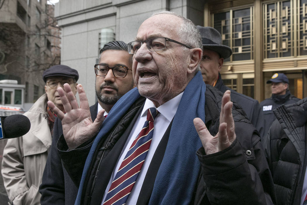 FILE - In this Dec. 2, 2019, file photo, attorney Alan Dershowitz talks to the press outside fe ...