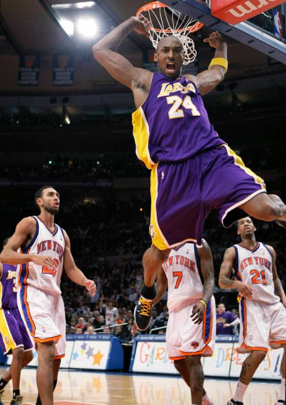 FILE - In this Feb. 2, 2009 file photo Los Angeles Lakers guard Kobe Bryant (24) reacts after a ...
