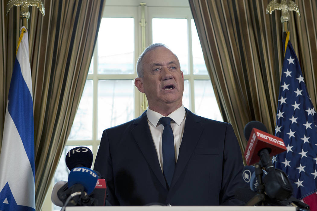 Israel Blue and White party leader Benny Gantz speaks during a news conference in Washington, M ...