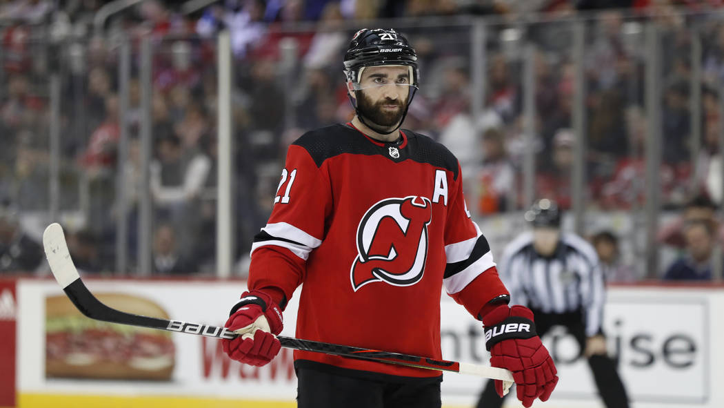 New Jersey Devils right wing Kyle Palmieri (21) and left wing