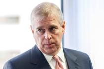 In a Monday, April 13, 2015 file photo, Britain's Prince Andrew visits the AkzoNobel Decorative ...