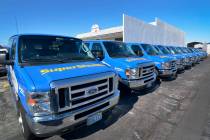 Some of the 15vehicles bought by SuperShuttle for its residential service are shown in the shut ...