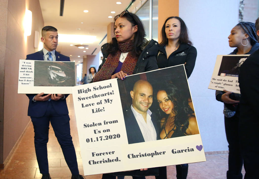 Maribel Garcia, center, wife of Christopher Garcia, 45, who was killed after a suspected DUI dr ...