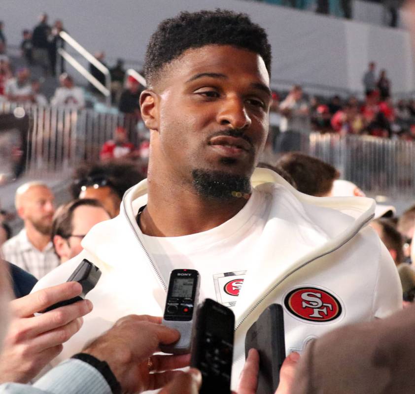 San Francisco 49ers defensive end Dee Ford takes questions from media during Super Bowl LIV Ope ...