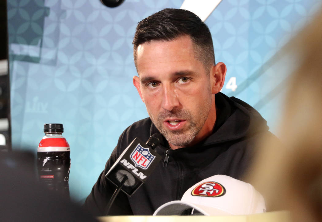 San Francisco 49ers head coach Kyle Shanahan answers questions during Super Bowl LIV Opening N ...