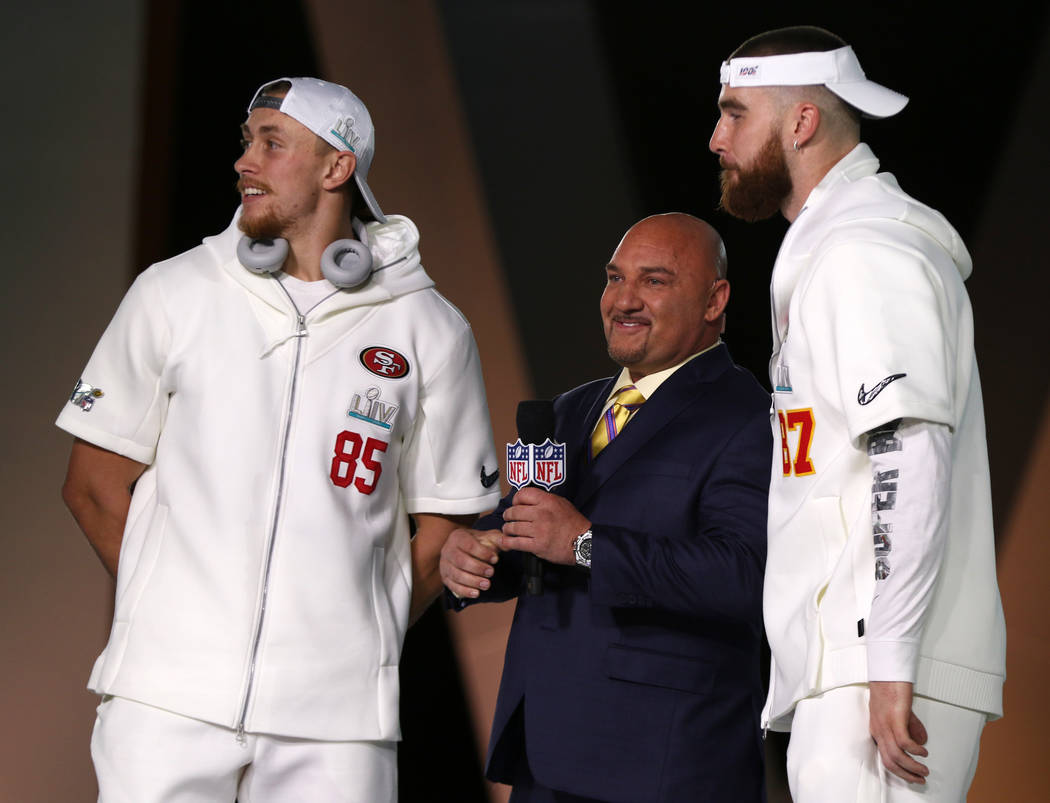 San Francisco 49ers tight end George Kittle, left, and Kansas City Chiefs tight end Travis Kelc ...