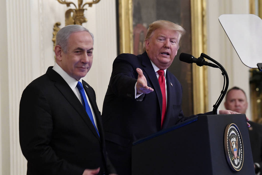 President Donald Trump speaks during an event with Israeli Prime Minister Benjamin Netanyahu in ...