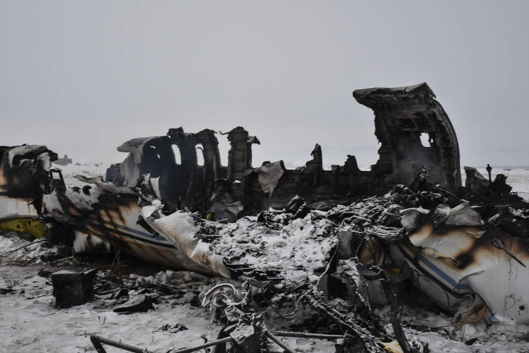 A wreckage of a U.S. military aircraft that crashed in Ghazni province, Afghanistan, is seen Mo ...