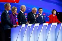 Democratic presidential candidate Sen. Bernie Sanders, I-Vt.,, center, speaks as fellow candida ...