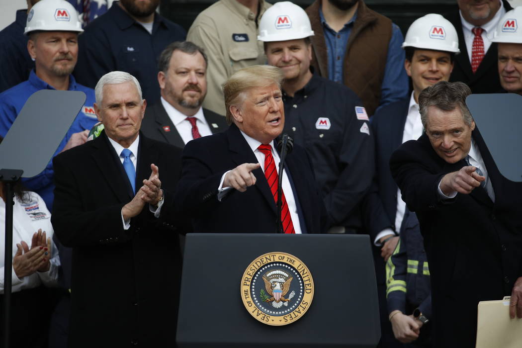 President Donald Trump speaks during an event at the White House to sign a new North American t ...