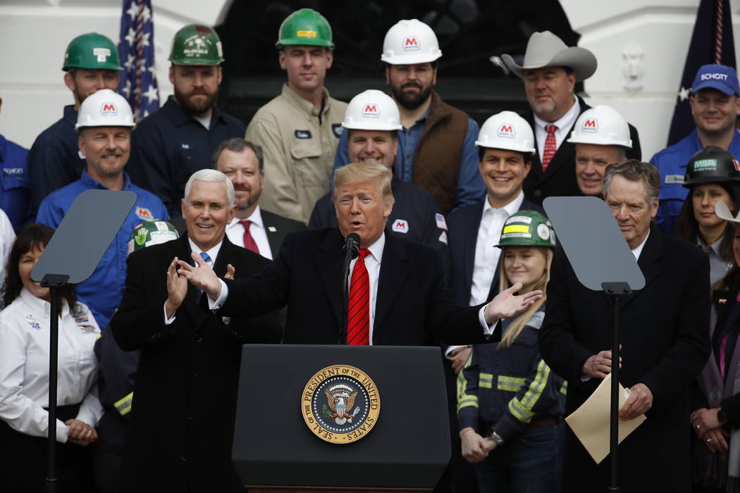 President Donald Trump speaks during an event at the White House to sign a new North American t ...