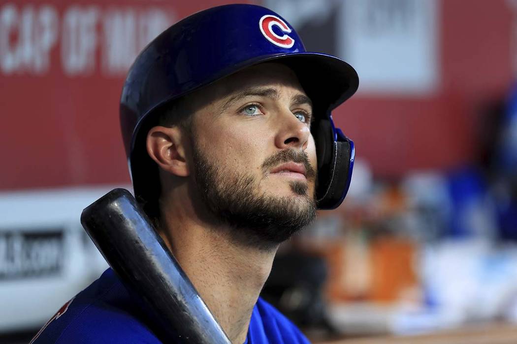 In this Aug. 10, 2019, file photo, Chicago Cubs' Kris Bryant (17) sits in the dugout during a b ...