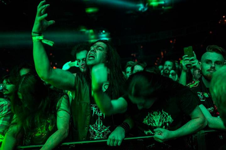 Fans react as Triumph of Death performs at the Mandalay Bay Events Center during the Psycho Las ...