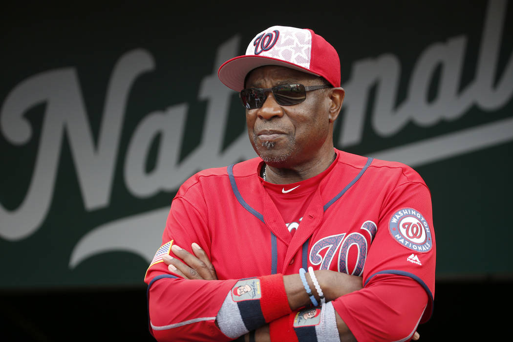 FILE- In this July 4, 2016, file photo, Washington Nationals manager Dusty Baker (12) stands i ...