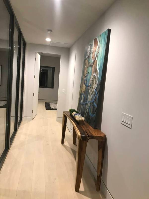 The hallway features artwork. (Kimberly Joi McDonald)