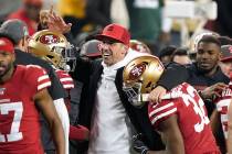 San Francisco 49ers head coach Kyle Shanahan, center, celebrates with players during the second ...