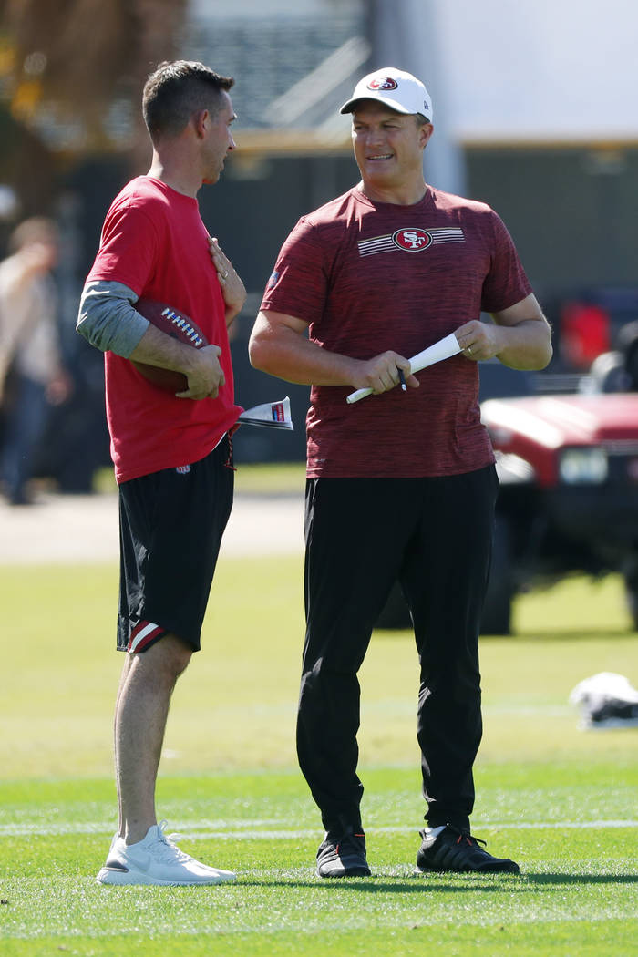 San Francisco 49ers general manager John Lynch, right, and head coach Kyle Shanahan talk as the ...