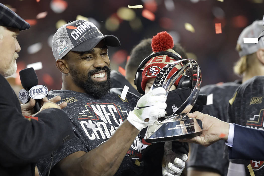 San Francisco 49ers running back Raheem Mostert celebrates after the NFL NFC Championship footb ...
