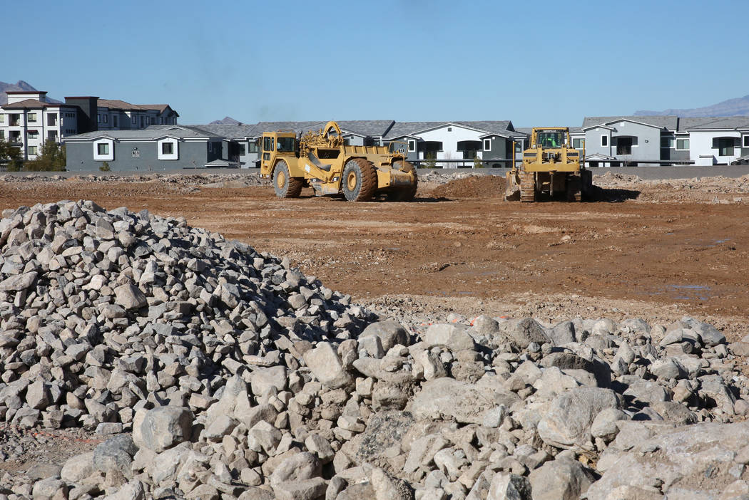 Heavy construction equipments used on construction sites are seen at The Bend, a retail project ...