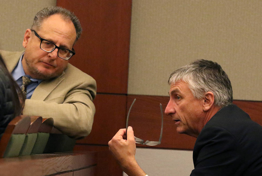 Former attorney William Gamage, right, talks to his attorney Bryan Cox prior to his sentencing ...