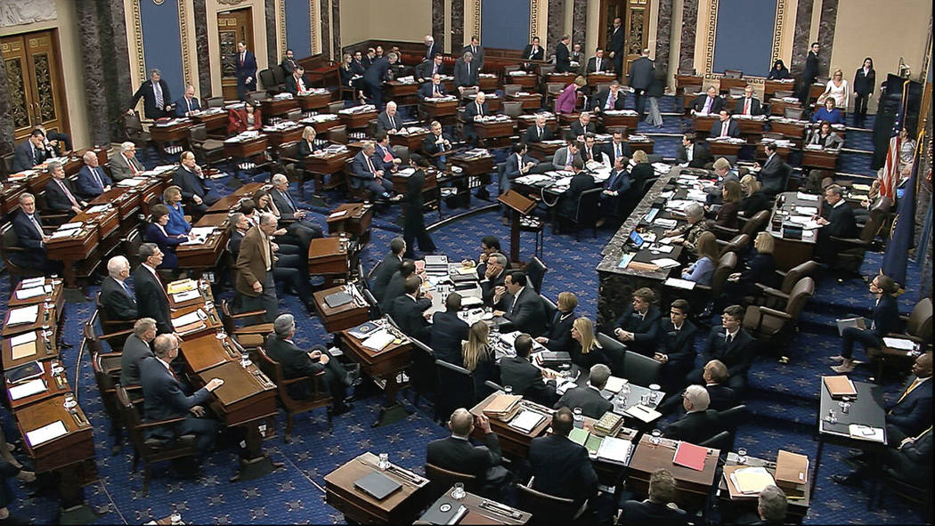 In this image from video, Senators cast their vote on the motion to allow additional witnesses ...