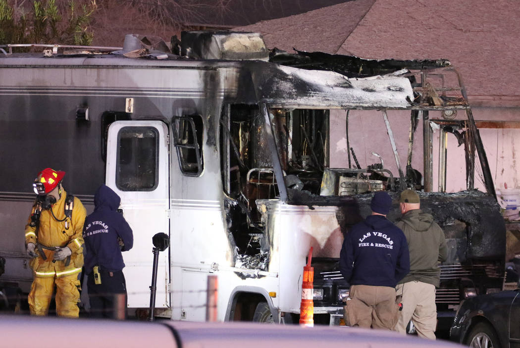 Las Vegas firefighters investigate the cause of a fatal fire in a recreational vehicle near Wes ...