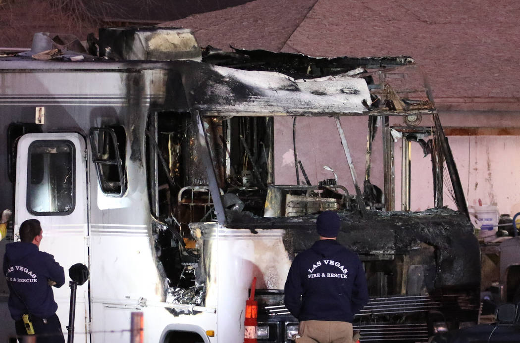 Las Vegas firefighters investigate the cause of a fatal fire in a recreational vehicle near Wes ...