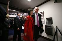 Nevada Gov. Steve Sisolak and his wife Kathy leave the Assembly chambers after delivering his S ...