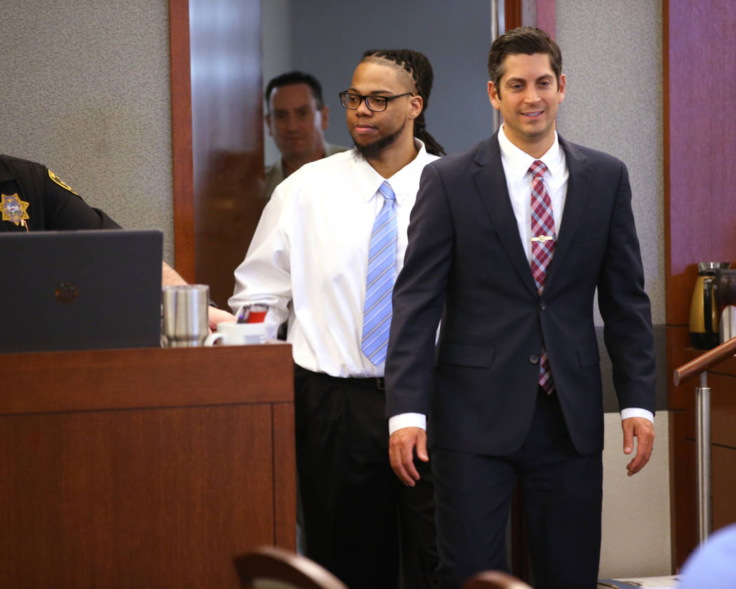Ray Charles Brown, left, arrives in the courtroom with one of his attorneys, Richard Tanasi, du ...