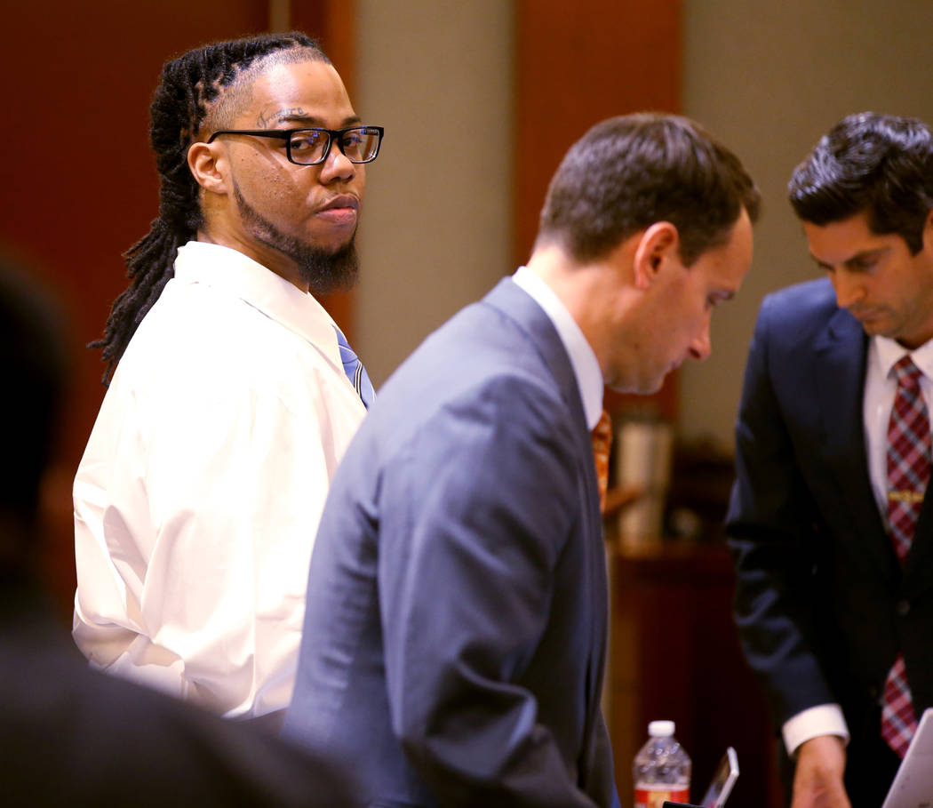 Ray Charles Brown, left, watches the jury leave the courtroom with his attorneys, Richard Tanas ...